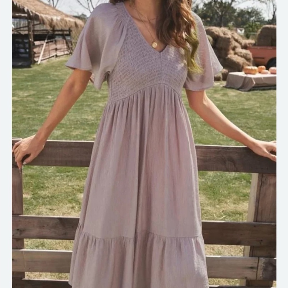 Light Blue Smocked Dress with sleeves.